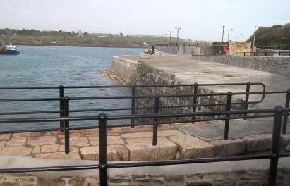 Historic enhancements at sluice with listed stable block and pump rose in far distance